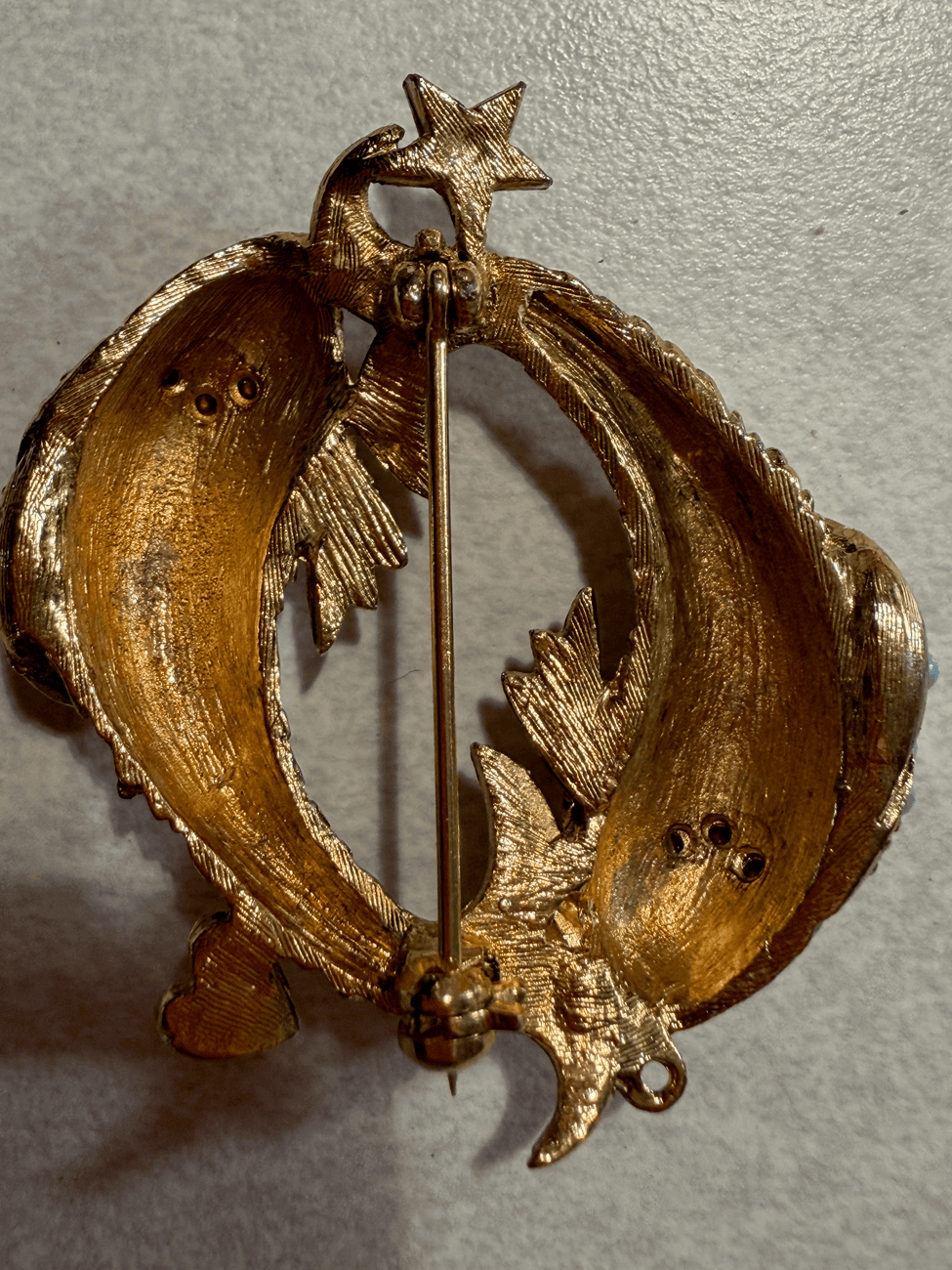 Double-fish brooch, reverse with pin and clasp